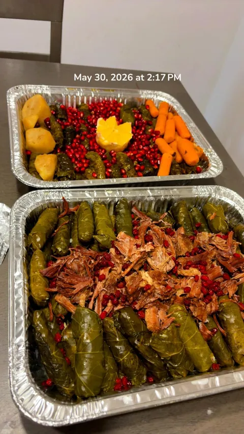 Family trays of stuffed vegetables arranged with colorful toppings.